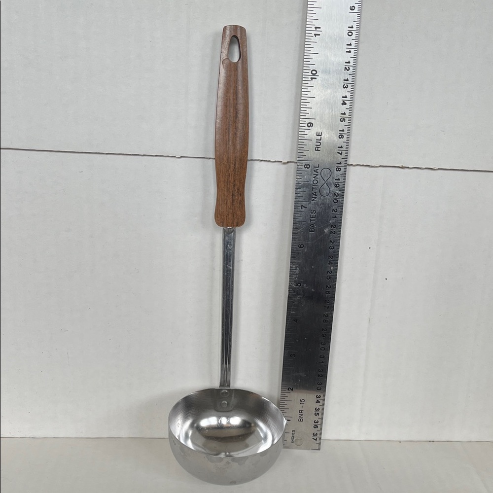 Vintage Ecko stainless steel ladle with a wood handle.